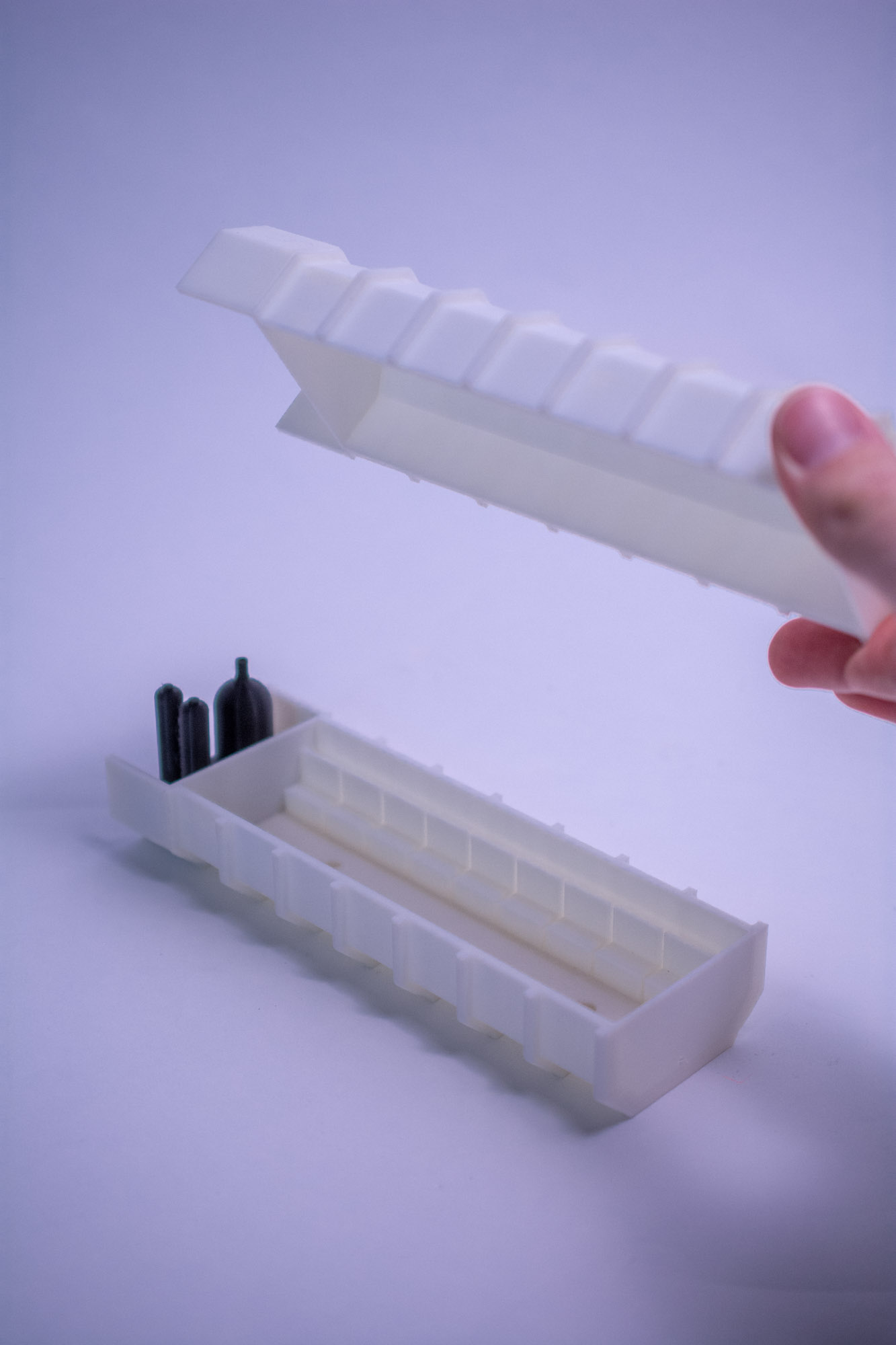 Refuge chamber fragment model held in hand